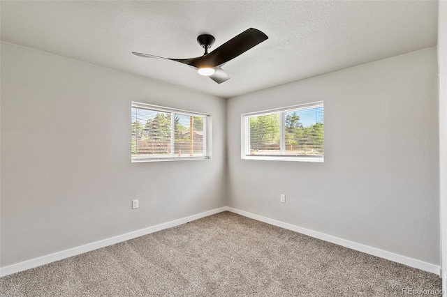 229-231 Crestone Ave, Colorado Springs, CO 80905 - carpeted spare room featuring healthy amount of natural light and ceiling fan