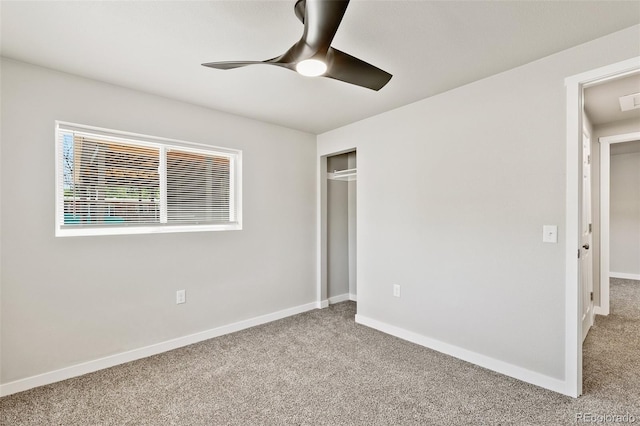 229-231 Crestone Ave, Colorado Springs, CO 80905 - unfurnished bedroom with carpet, a closet, and a ceiling fan