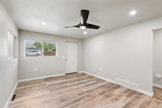 229-231 Crestone Ave, Colorado Springs, CO 80905 - spare room featuring a ceiling fan, light wood-style floors, and recessed lighting