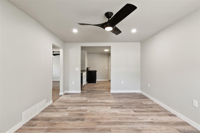 229-231 Crestone Ave, Colorado Springs, CO 80905 - empty room with a ceiling fan, recessed lighting, and light wood-style floors