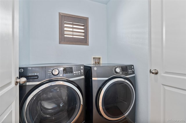 10044 Martin Luther King Blvd, Denver, CO 80238 - laundry area with washing machine and dryer