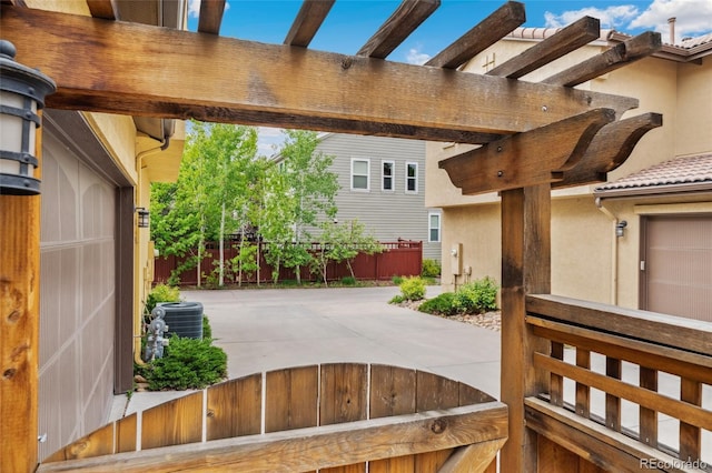 10044 Martin Luther King Blvd, Denver, CO 80238 - view of patio featuring cooling unit and a pergola