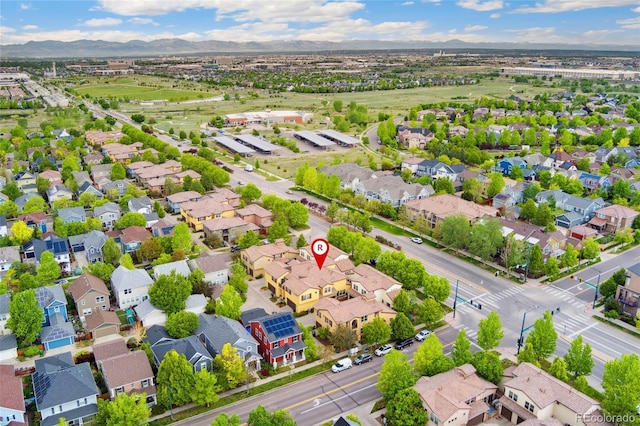 10044 Martin Luther King Blvd, Denver, CO 80238 - aerial perspective of suburban area with a mountainous background