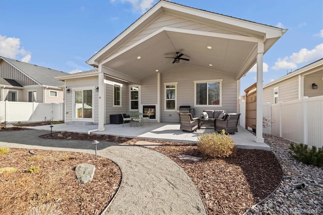 863 Shirttail Peak Dr, Windsor, CO 80550 - back of house featuring an outdoor hangout area, ceiling fan, a fenced backyard, and a patio