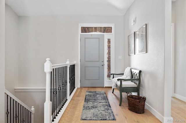 863 Shirttail Peak Dr, Windsor, CO 80550 - foyer entrance with light wood-type flooring and baseboards