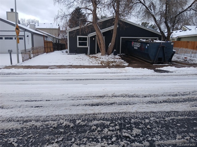 view of front of home with fence