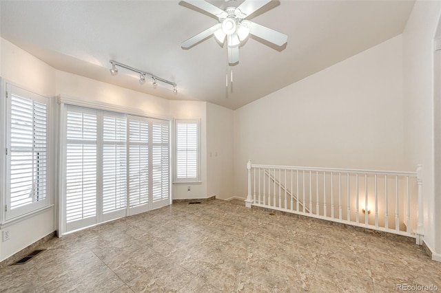 unfurnished room with ceiling fan