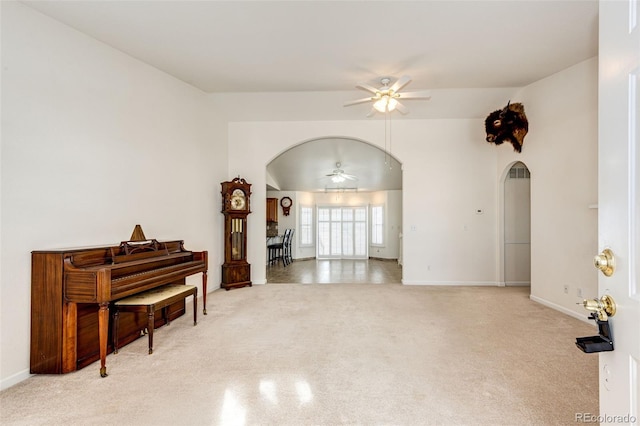 misc room featuring ceiling fan and light colored carpet