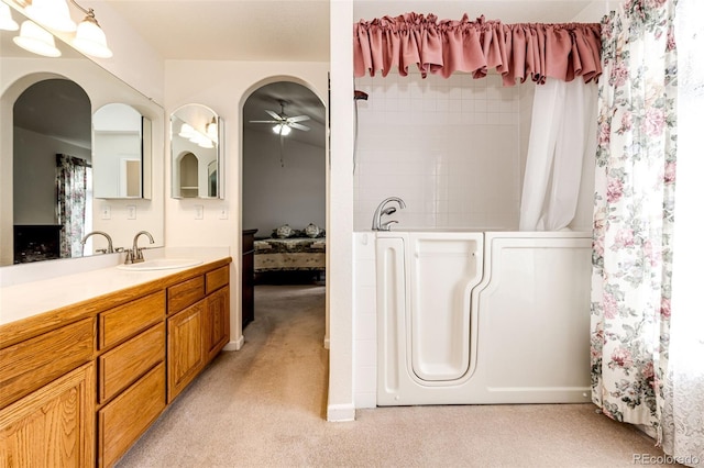 bathroom with vanity and ceiling fan