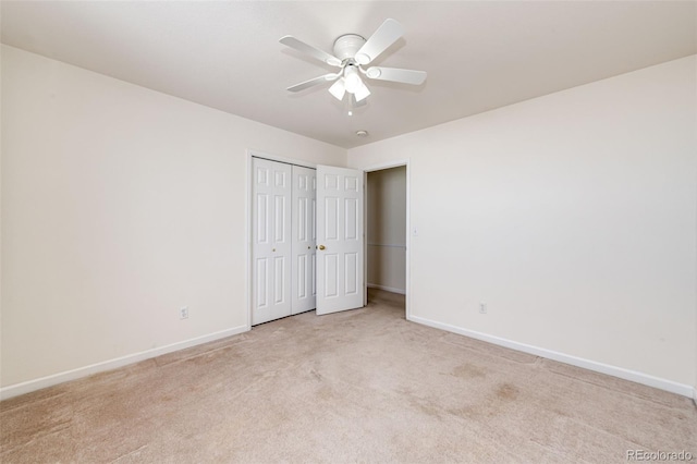 unfurnished bedroom with light carpet and ceiling fan