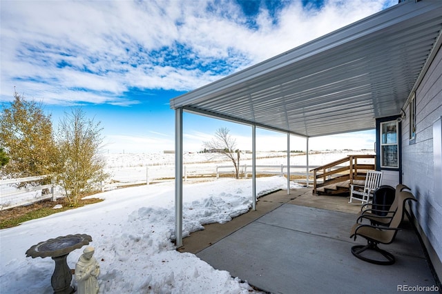 view of snow covered patio