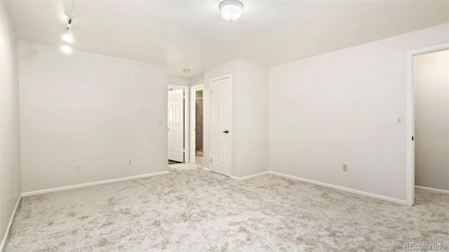 2918 Silverplume Dr Unit C1, Fort Collins, CO 80526 - empty room featuring carpet and rail lighting
