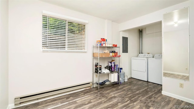 2918 Silverplume Dr Unit C1, Fort Collins, CO 80526 - washroom with electric panel, a baseboard radiator, washing machine and clothes dryer, and wood finished floors