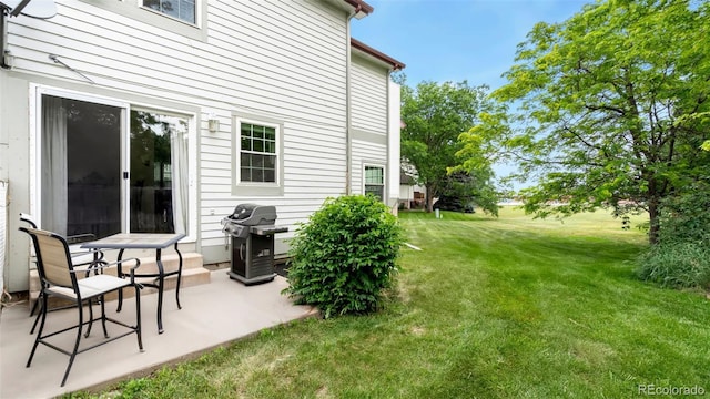 2918 Silverplume Dr Unit C1, Fort Collins, CO 80526 - view of grassy yard featuring a patio