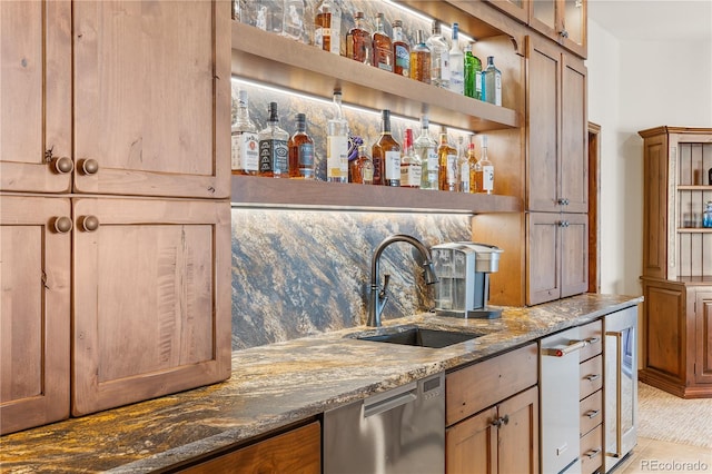 bar featuring sink, light tile patterned floors, stainless steel dishwasher, and stone countertops