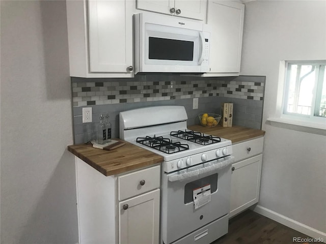 kitchen with white cabinetry, white appliances, wooden counters, and tasteful backsplash