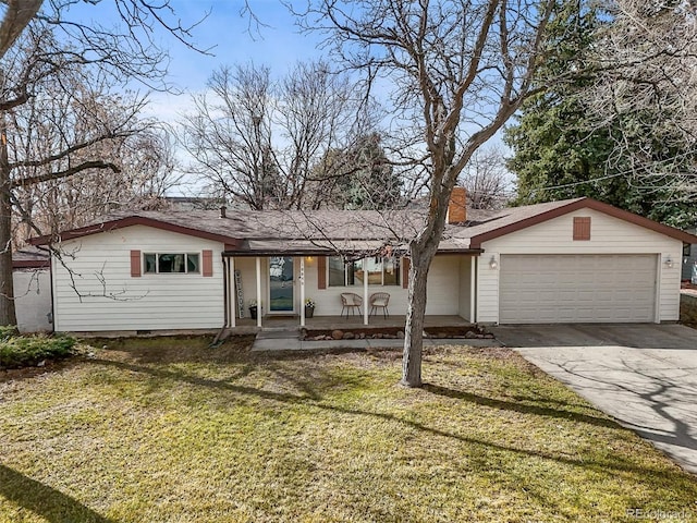 ranch-style house with a chimney, covered porch, a garage, driveway, and a front lawn