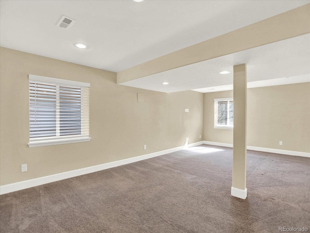 below grade area with carpet, baseboards, and recessed lighting