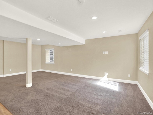 basement featuring carpet flooring, baseboards, and recessed lighting