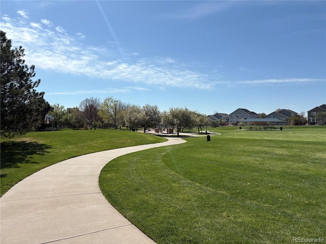view of community with a yard