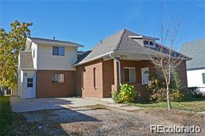 4177 Sheridan Blvd, Denver, CO 80212 - rear view of property with a patio area and driveway
