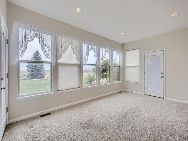 view of carpeted spare room