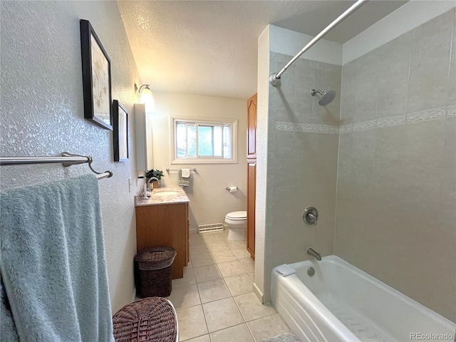 bathroom with toilet, vanity, shower / bathtub combination, tile patterned floors, and a textured ceiling