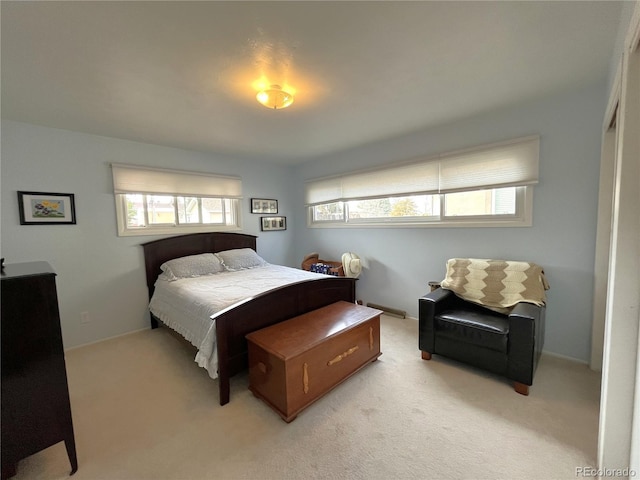 bedroom with light carpet