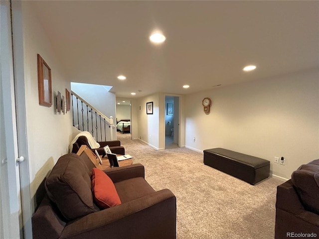 living room featuring stairway, recessed lighting, baseboards, and light carpet