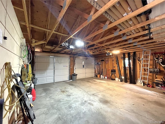 garage featuring a garage door opener