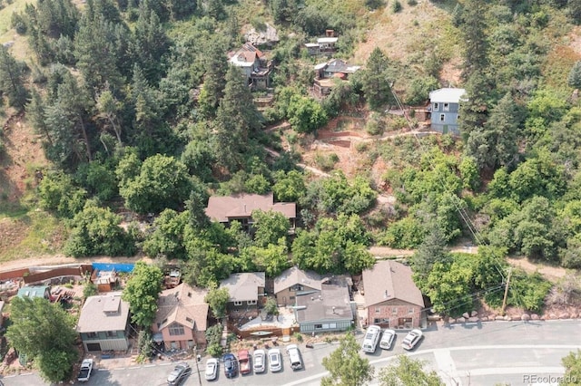 bird's eye view with a residential view and a forest view