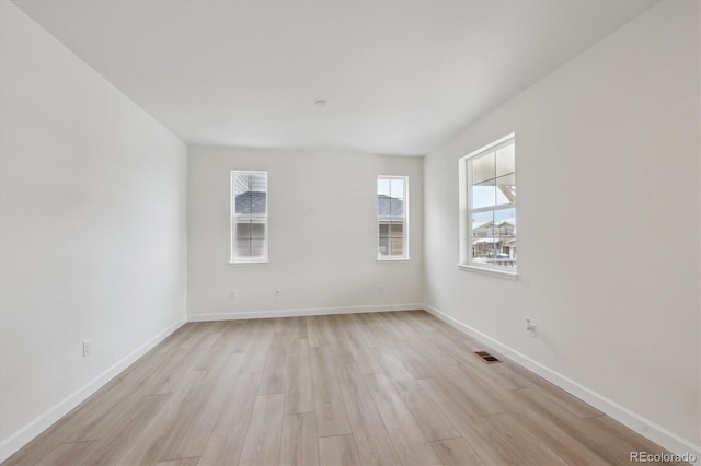 empty room featuring light hardwood / wood-style flooring