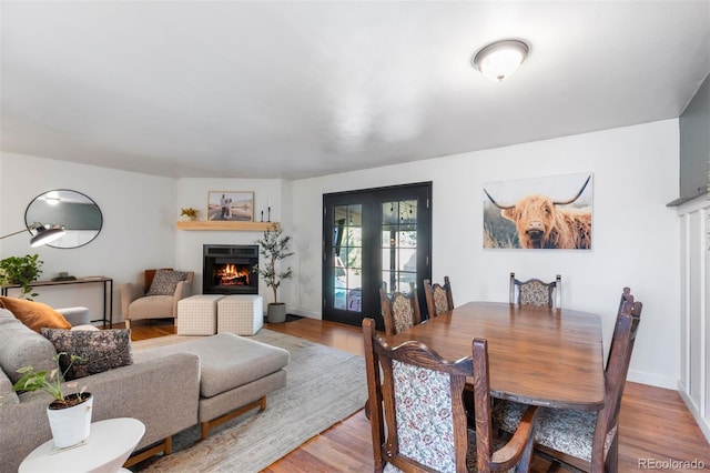 dining room with light hardwood / wood-style flooring