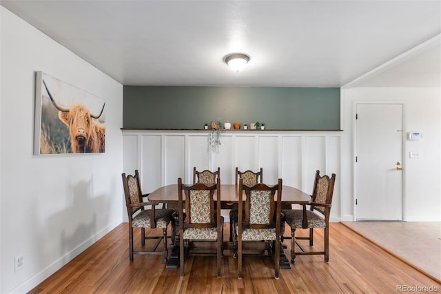 dining room with hardwood / wood-style floors