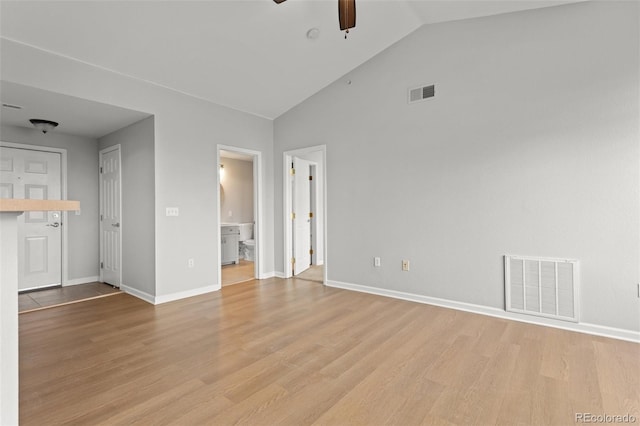 7440 S Blackhawk St Unit 207, Englewood, CO 80112 - unfurnished living room with a ceiling fan, light wood-style floors, and high vaulted ceiling