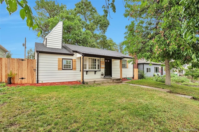 1325 Dayton St, Aurora, CO 80010 - ranch-style house featuring a porch