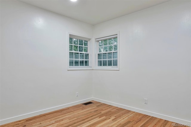 1325 Dayton St, Aurora, CO 80010 - empty room with baseboards and light wood-type flooring