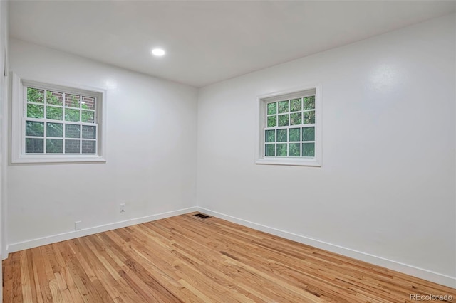 1325 Dayton St, Aurora, CO 80010 - empty room with light wood finished floors and baseboards