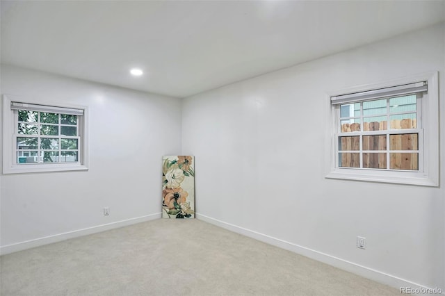 1325 Dayton St, Aurora, CO 80010 - carpeted spare room featuring baseboards and recessed lighting