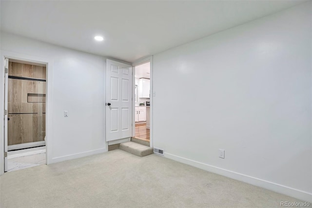 1325 Dayton St, Aurora, CO 80010 - unfurnished bedroom with carpet and recessed lighting