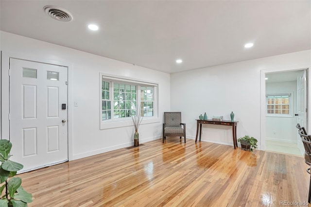 1325 Dayton St, Aurora, CO 80010 - entrance foyer featuring light wood finished floors and recessed lighting
