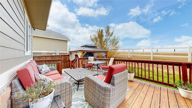 wooden deck with a gazebo