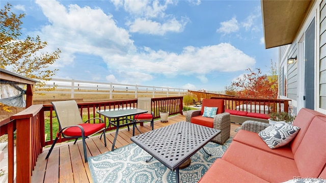 wooden terrace featuring outdoor lounge area