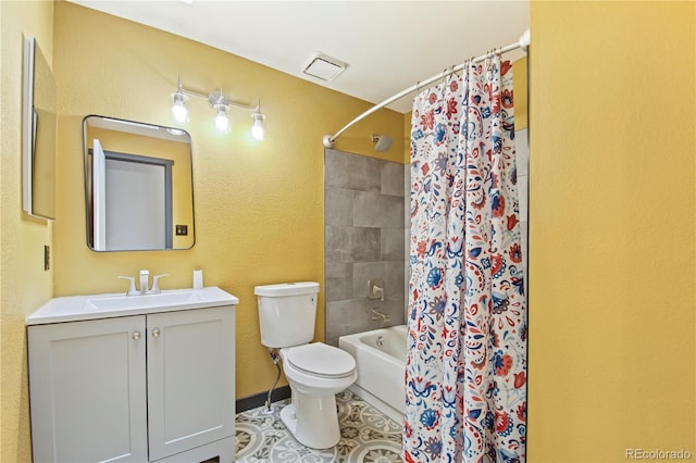 full bath featuring a textured wall, vanity, toilet, shower / bath combo with shower curtain, and visible vents
