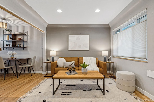 living room with light hardwood / wood-style flooring