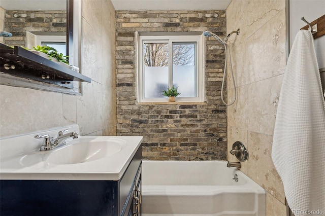 bathroom featuring vanity and shower / bath combo