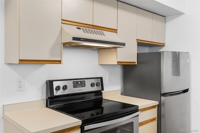20 S Boulder Cir Unit 2109, Boulder, CO 80303 - kitchen featuring stainless steel range with electric cooktop, extractor fan, and light countertops