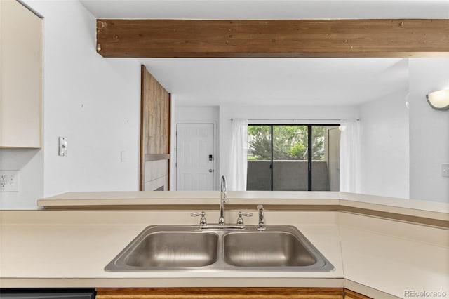 20 S Boulder Cir Unit 2109, Boulder, CO 80303 - kitchen with a sink, light countertops, and beam ceiling