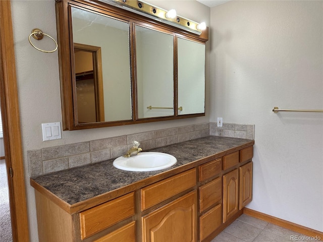 bathroom featuring vanity and tile patterned flooring