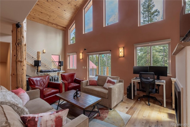 344 Puma Pl, Fairplay, CO 80440 - living room with high vaulted ceiling, wood-type flooring, wood ceiling, and a desk